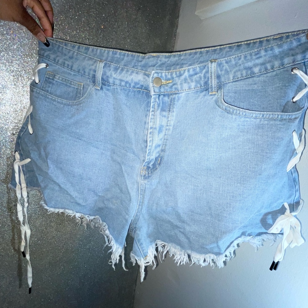 Jean shorts with cross on side